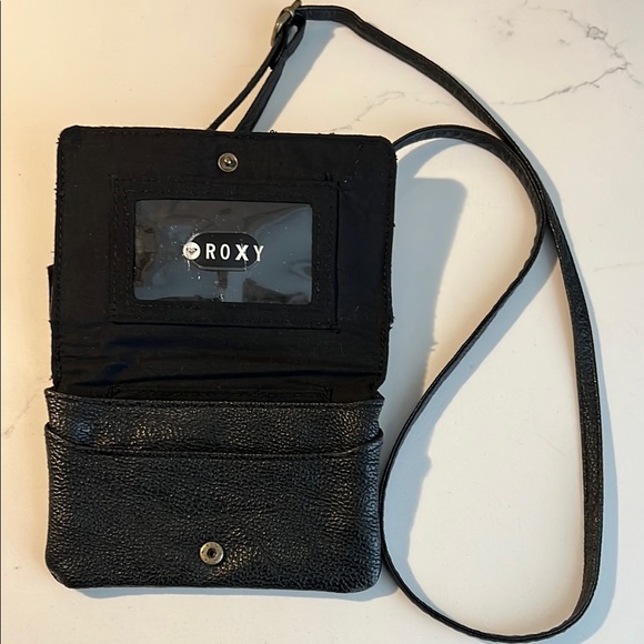 Roxy Black Leather Crossbody Bag with Flap Closure - Picture 2 of 4